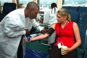 A photo of a woman giving blood.