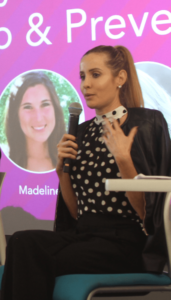 Laura speaking during a breast cancer awareness panel at 23andMe.
